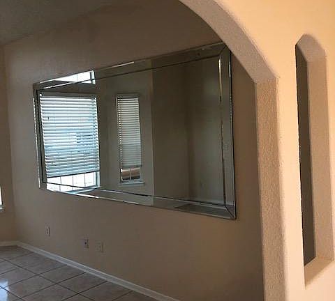 Look out from formal dining room into formal living room.