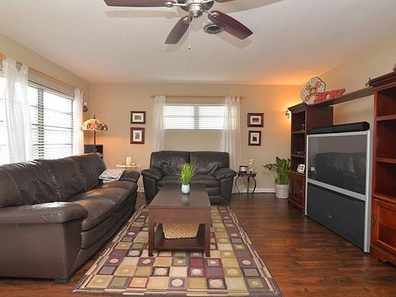 Spacious Living Room sits adjacent to the Kitchen and Dinett