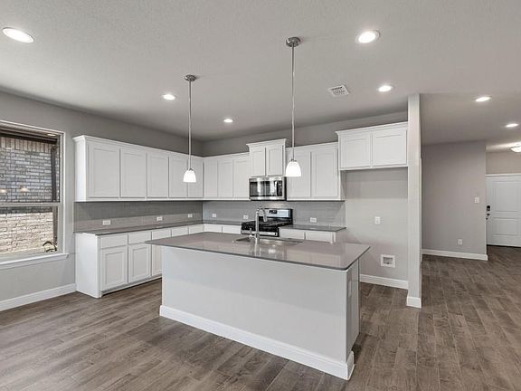 Kitchen - All Home and community information, including pricing, included features, terms, availability and amenities, are subject to change at any time without notice or obligation. All Drawings, pictures, photographs, video, square footages, floor plans, elevations, features, colors and sizes are approximate for illustration purposes only and will vary from the homes as built.