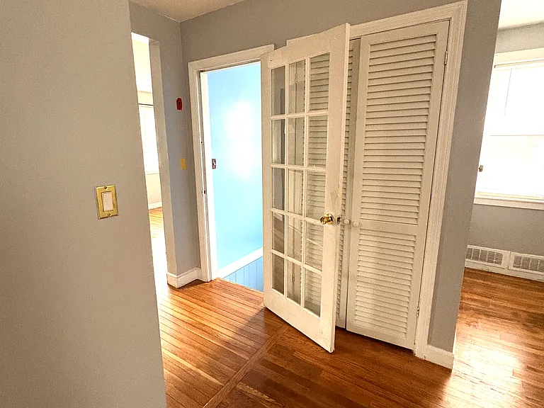 living room towards basement stairs