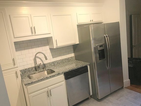 New stainless appliances, fridge with in-door icemaker. New white cabinets
