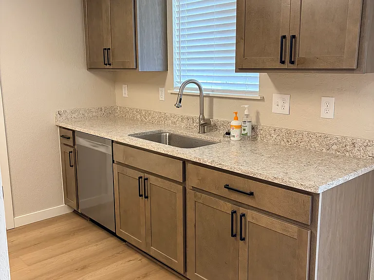 HUGE sink, new faucets, new window coverings, new lighting, and more.