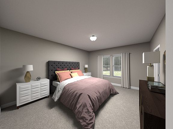 The luxurious primary suite is the perfect place to relax and unwind after a long day.