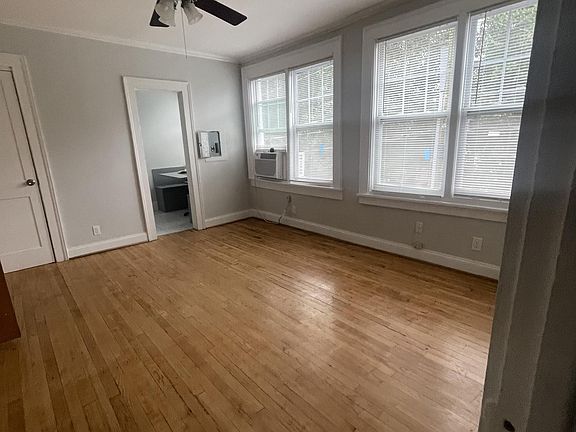 Beautiful hardwood floors and 52 inch ceiling fan