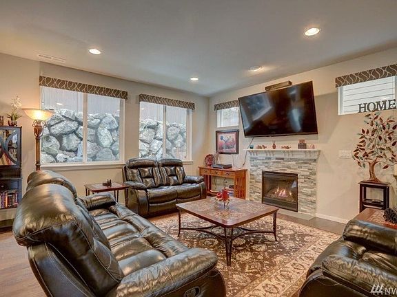 Spacious great room with cozy gas fireplace.