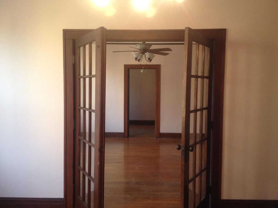 Standing in DR looking through living room into sm bedroom/o
