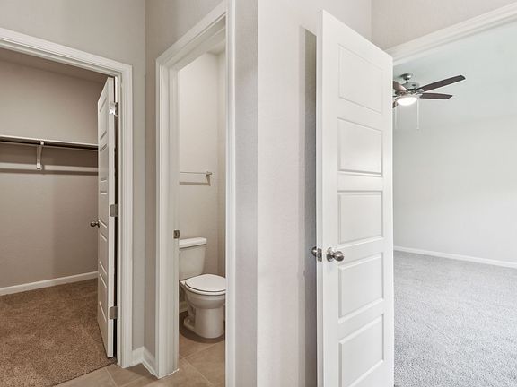 Primary suite bathroom in the Hughes floorplan at a Meritage Homes community.
