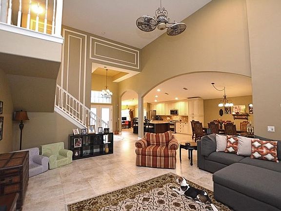 Architectural details add visual interest and warmth to this living space.
