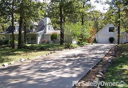 Street View of YOUR future Home!
						:
						Many Trees, Lots of shade aids in low a/c electric bill. Birds and squirrels!