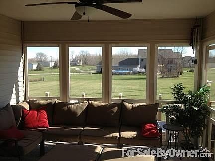 Screen porch
						:
						Spacious screen porch with fan provides great view of 1 acre lot