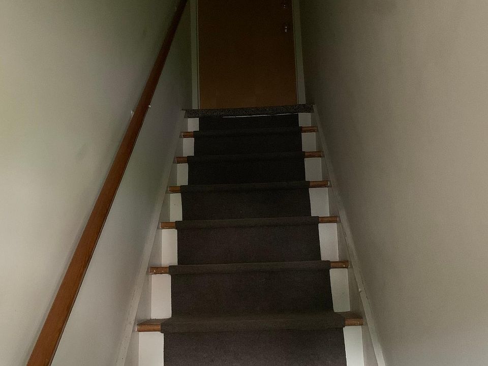 Separate entrance and stairway up to the apartment