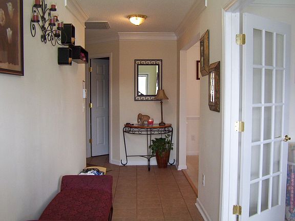 Tiled, 2 story foyer & entry hall