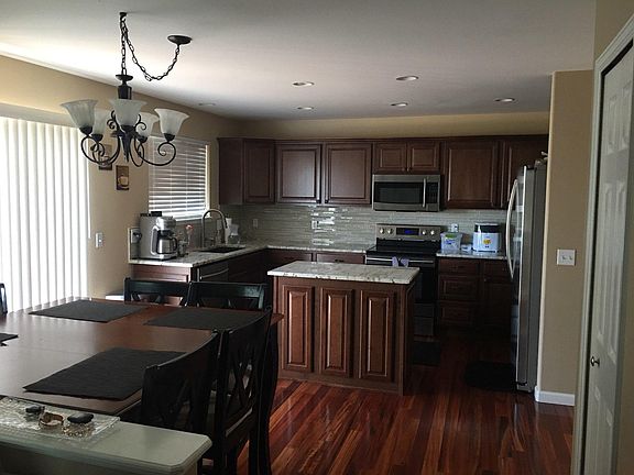 new upgraded kitchen with granite counters