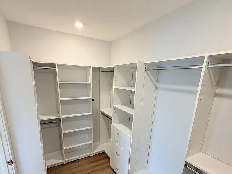 Built-in master closet with ample storage space