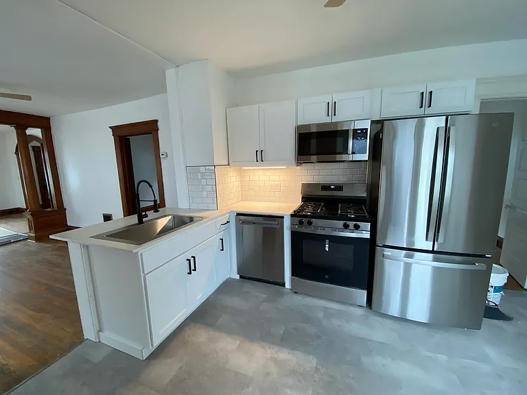 Be the first to enjoy this completely new kitchen with new flooring, an open concept, new stainless steel appliances, subway tile backsplash, and even a dishwasher. You won't find too many kitchens this nice on Tipp Hill!