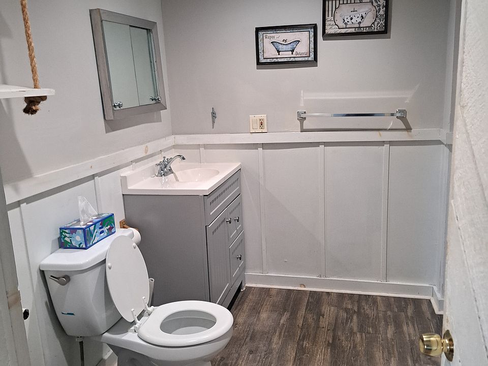 Nice sized bathroom with full sized bathtub.