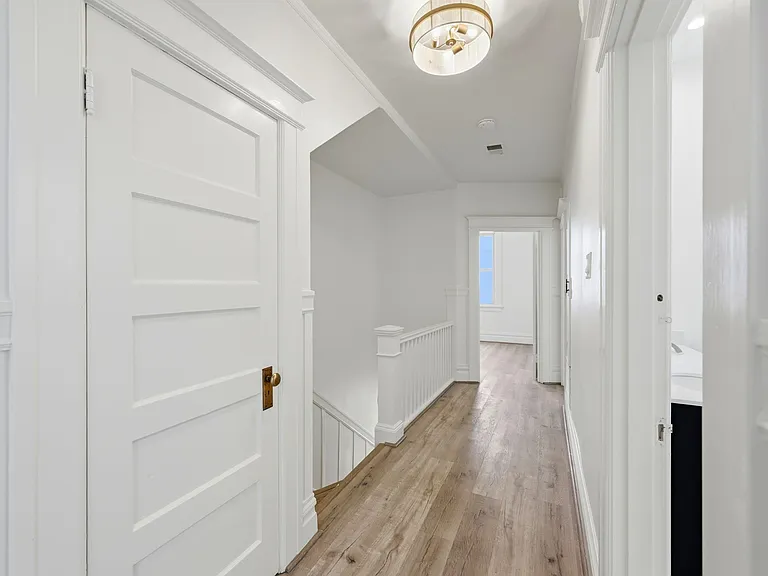Hallway Upstairs leading to 2 Bedrooms and full Bath