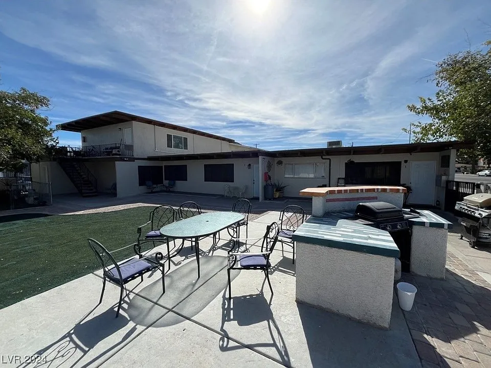 Area for BBQ and patio set.