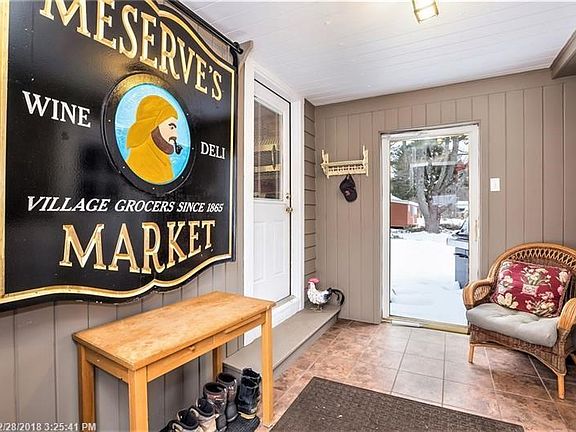 Welcome! As you enter off the attached 1 car garage you are the welcomed into mud room with access to the back deck and yard.