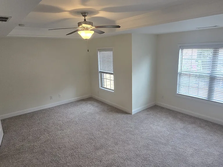 Master Bedroom facing the driveway