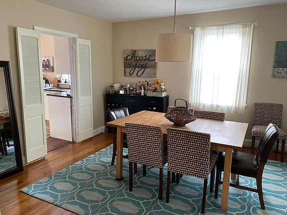Dining room on main level - opens into front hall/living room and into kitchen