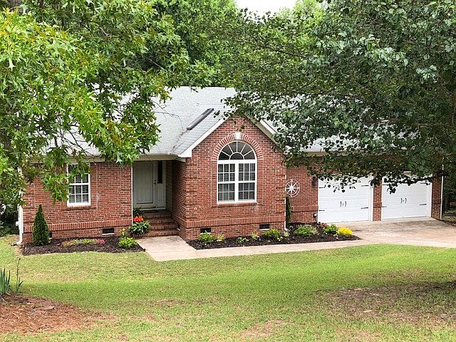 Brick and Vinyl Exterior
