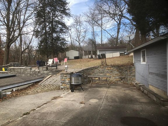BACKYARD W UPPER AND LOWER PATIOS