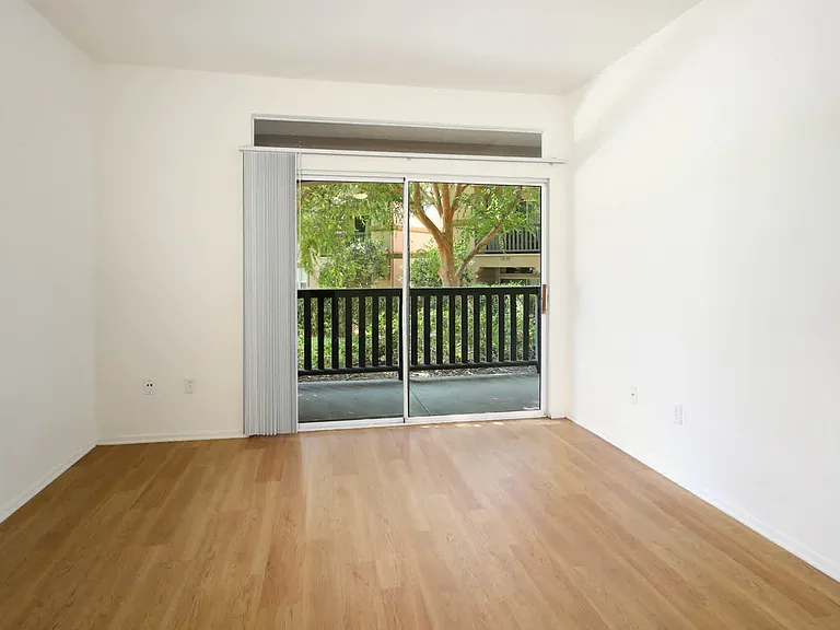 Living Room with Hard Surface Flooring and Balcony