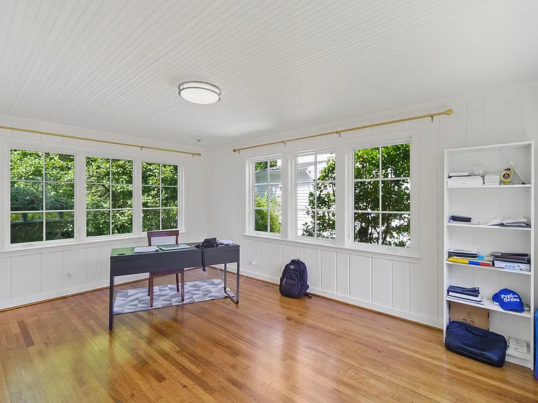 Light-filled sunroom for home office or playroom