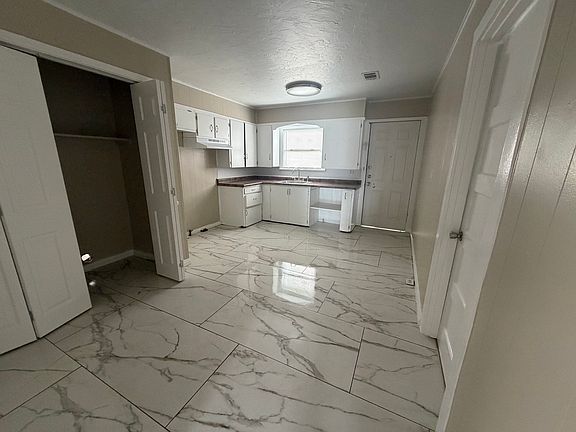 Kitchen - also has the washer and Dryer closet (far left)
