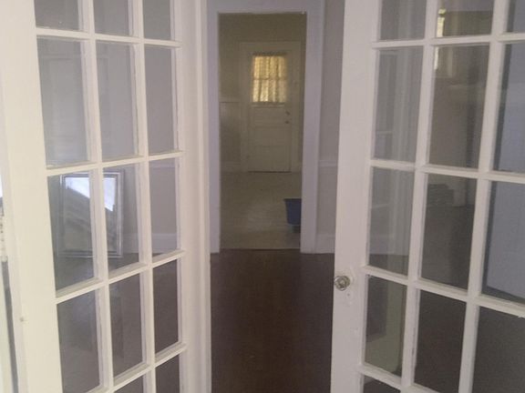 Doors between living room and dining room