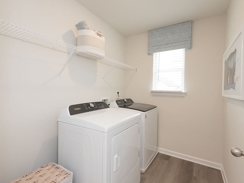 Laundry days have never been easier with this large, spacious laundry room.