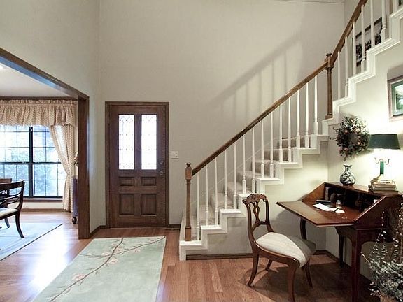 Welcome! The two story entry has hardwood floors.