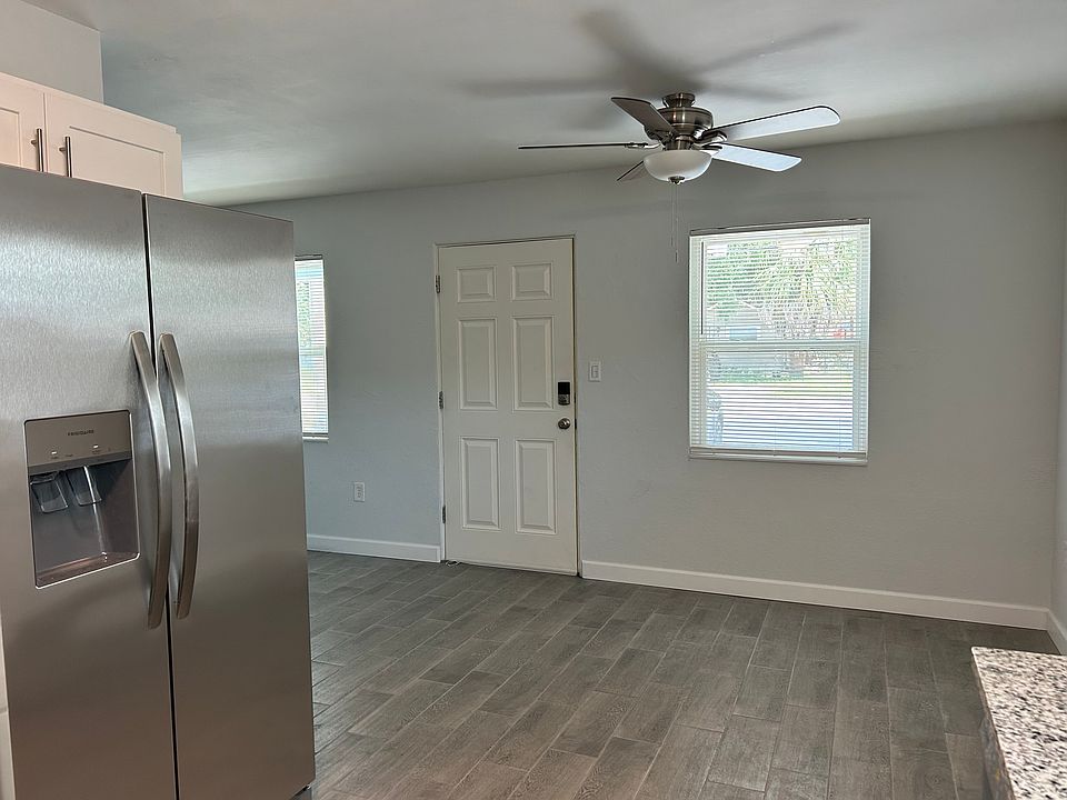 New neutral tiles throughout unit