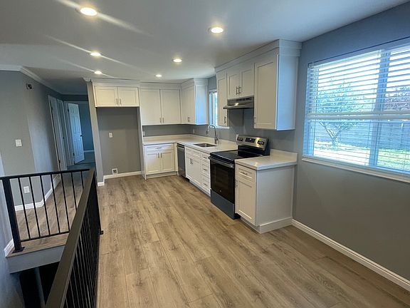 5th image of 6055 S Hazelhurst Dr