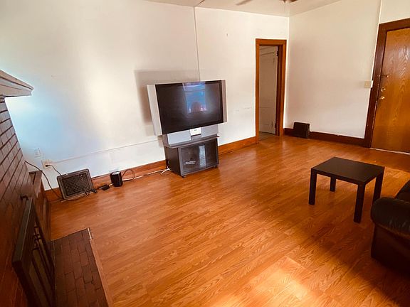 Spacious living area. Will be much brighter with same flooring pictured on second floor