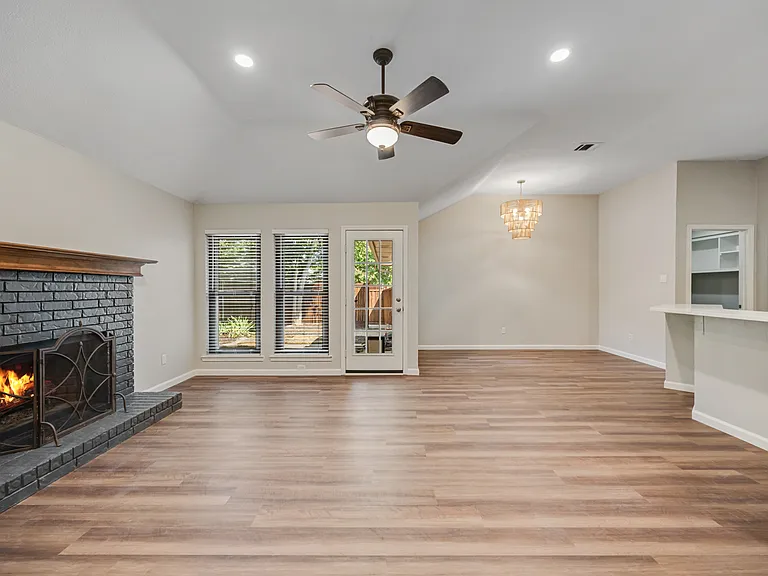 Living/Dining Area/Breakfast Bar/Gas Fireplace.