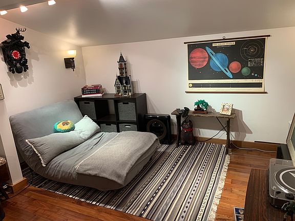 Futon lounger/sleeper in studio.