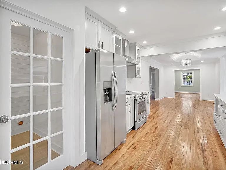 *original listing photo from when we purchased the home (kitchen)