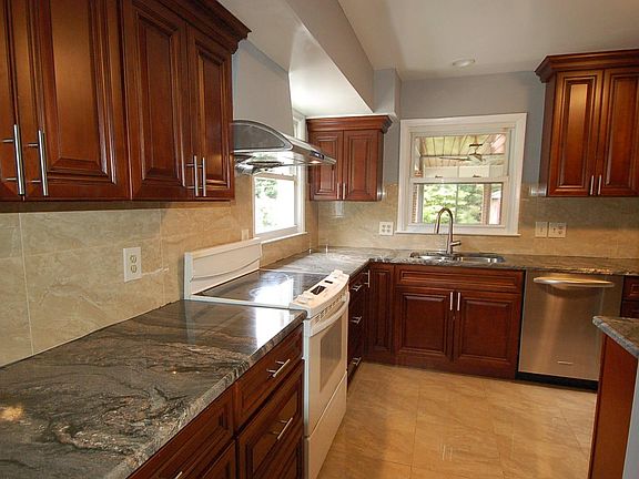 Stove has been replaced with stainless steel.