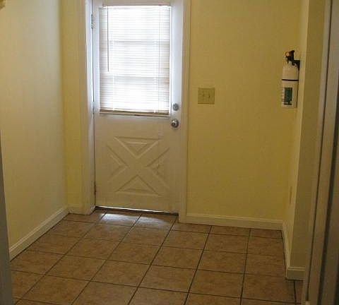 Foyer with ceramic tile