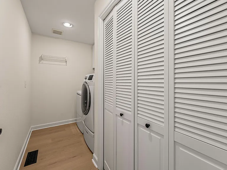 Laundry room with washer and dryer