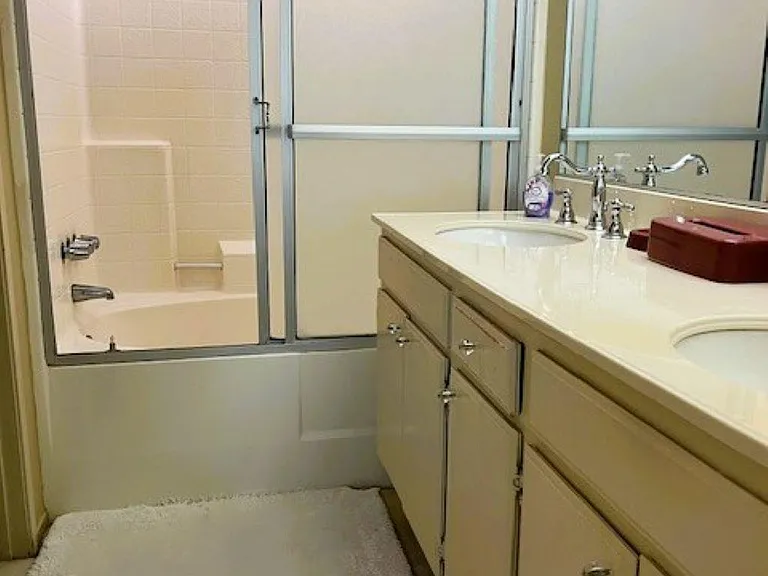 Full Master bathroom with two sinks.