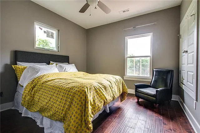 Primary bedroom with custom window treatments (not pictured)