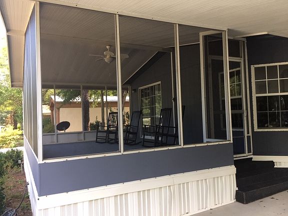 Relax on front screen porch