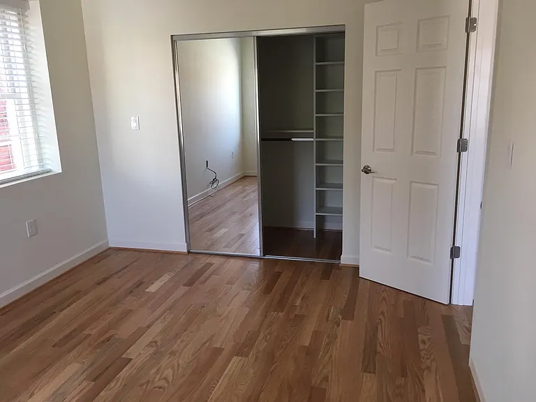 Mirrored sliding closet doors.