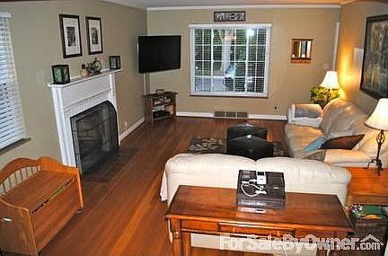 Front Main Room
						:
						Beautiful exposed hardwood floors, wood-burning fireplace