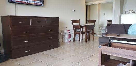 Queen cabinet bed with TV bed above.