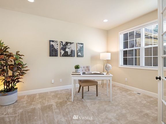 Just off the entry are French doors to the main level office.