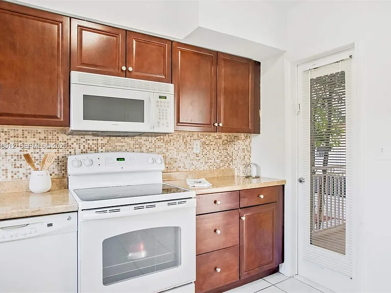 10001 W Bay Harbor Dr #208 — Photo 10